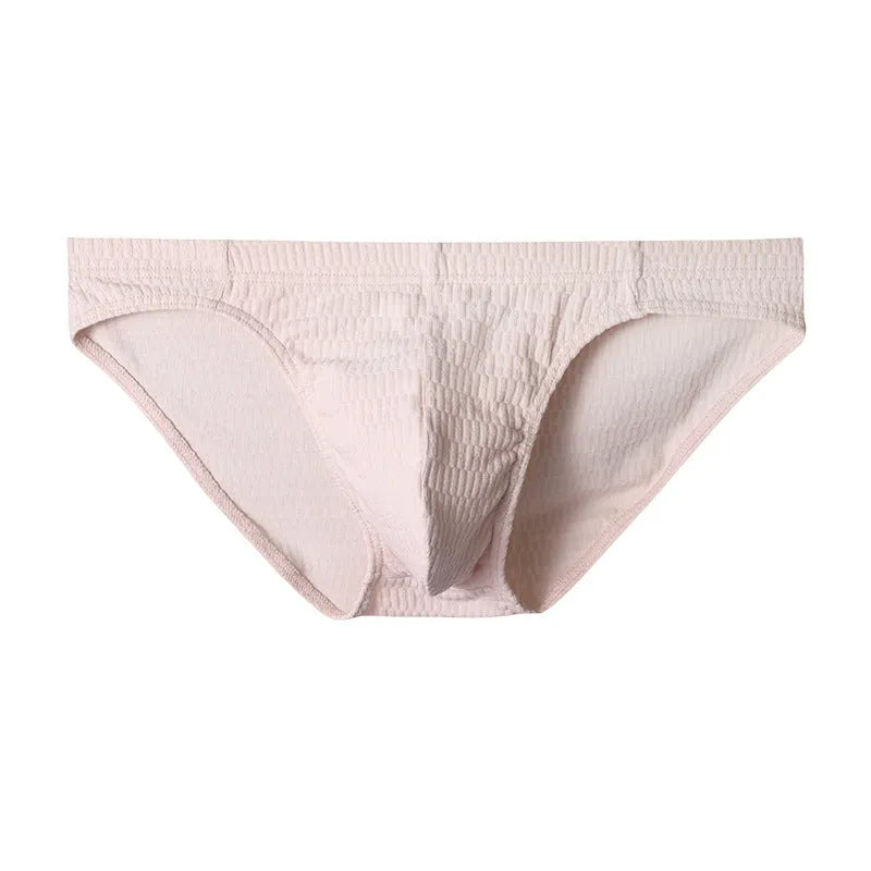 Men's solid colour cotton briefs with mid waist and triangle style in apricot black and skin colour.