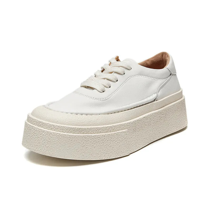 Women's black and white platform casual sports shoes with cowhide leather upper and round toe.