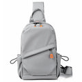 Men's black casual crossbody bag made from waterproof polyester with an adjustable shoulder strap.