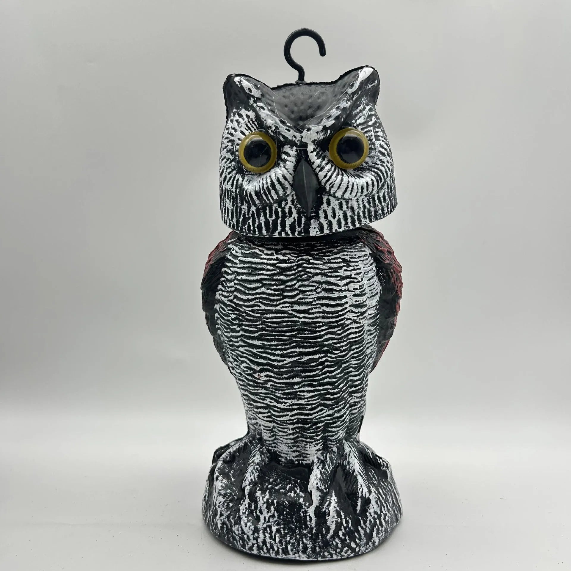 Artificial owl bird deterrent decoy with realistic features for outdoor garden use