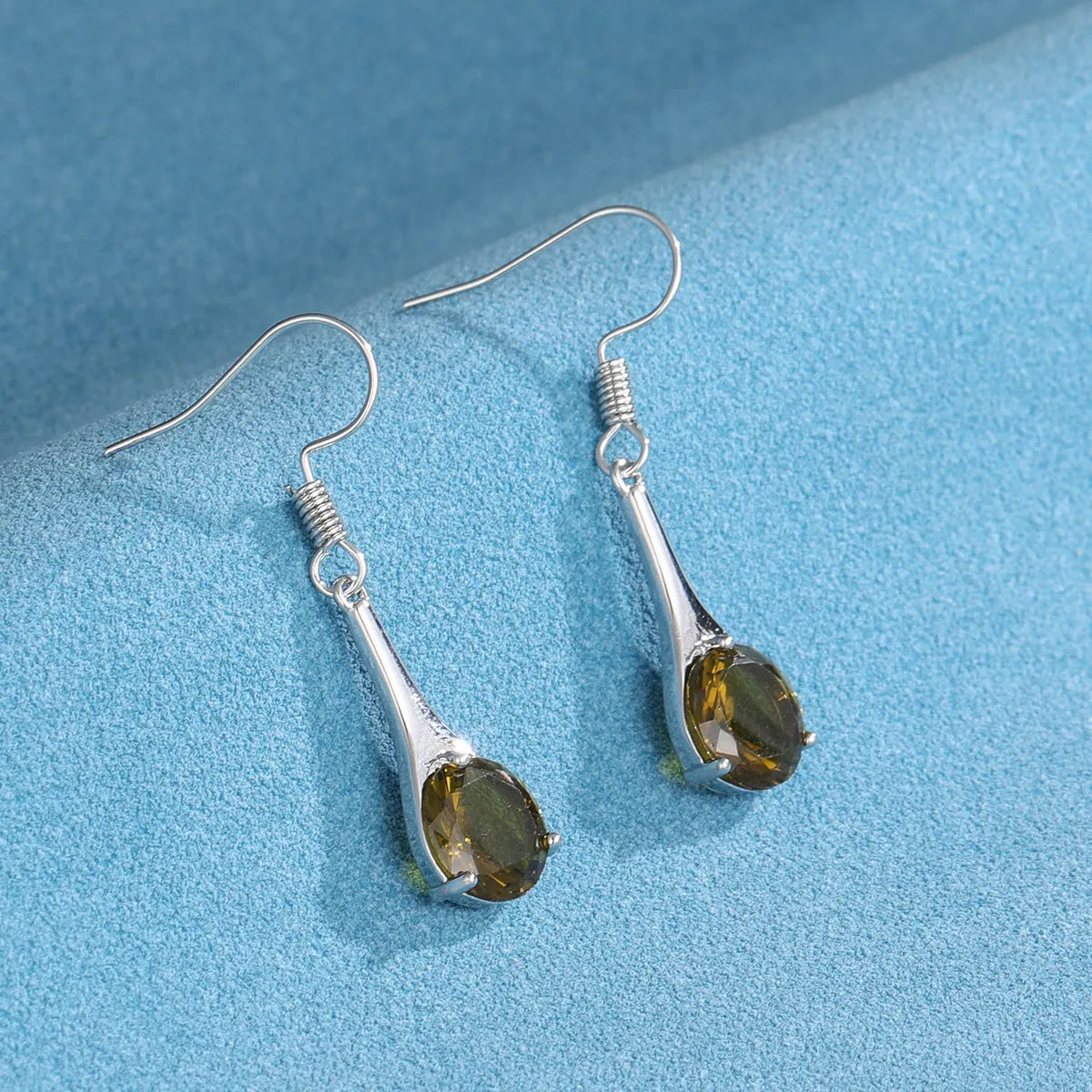 Olive green topaz water drop shape earrings with retro minimalist design and electroplated alloy construction