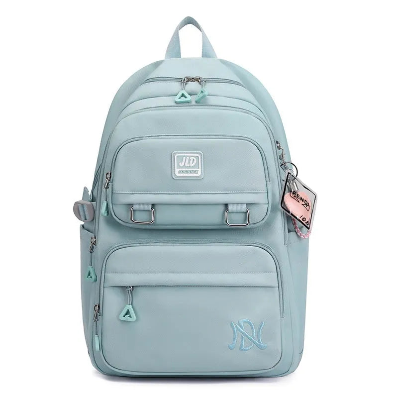 Large capacity girls' school backpack in nylon, showing colour options and physiological back support design.