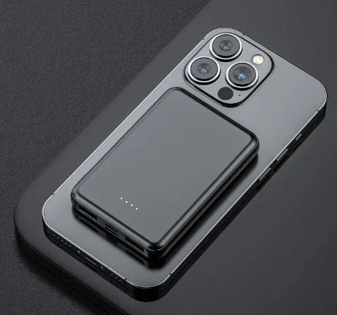 Black and white universal USB power bank for heated vests, showing compact size