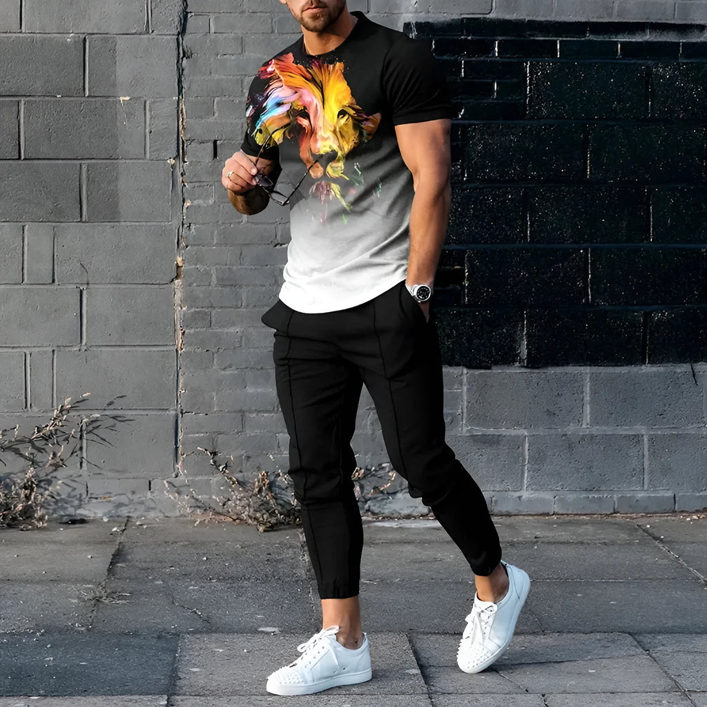 Man wearing a blue short-sleeved round neck pullover and matching trousers from a polyester sportswear set.