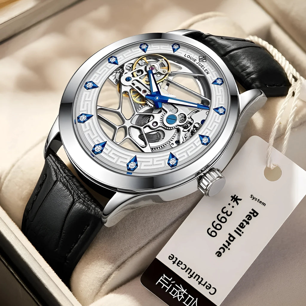 Men's silver mechanical watch with white dial, blue luminous hands, leather strap, and butterfly buckle