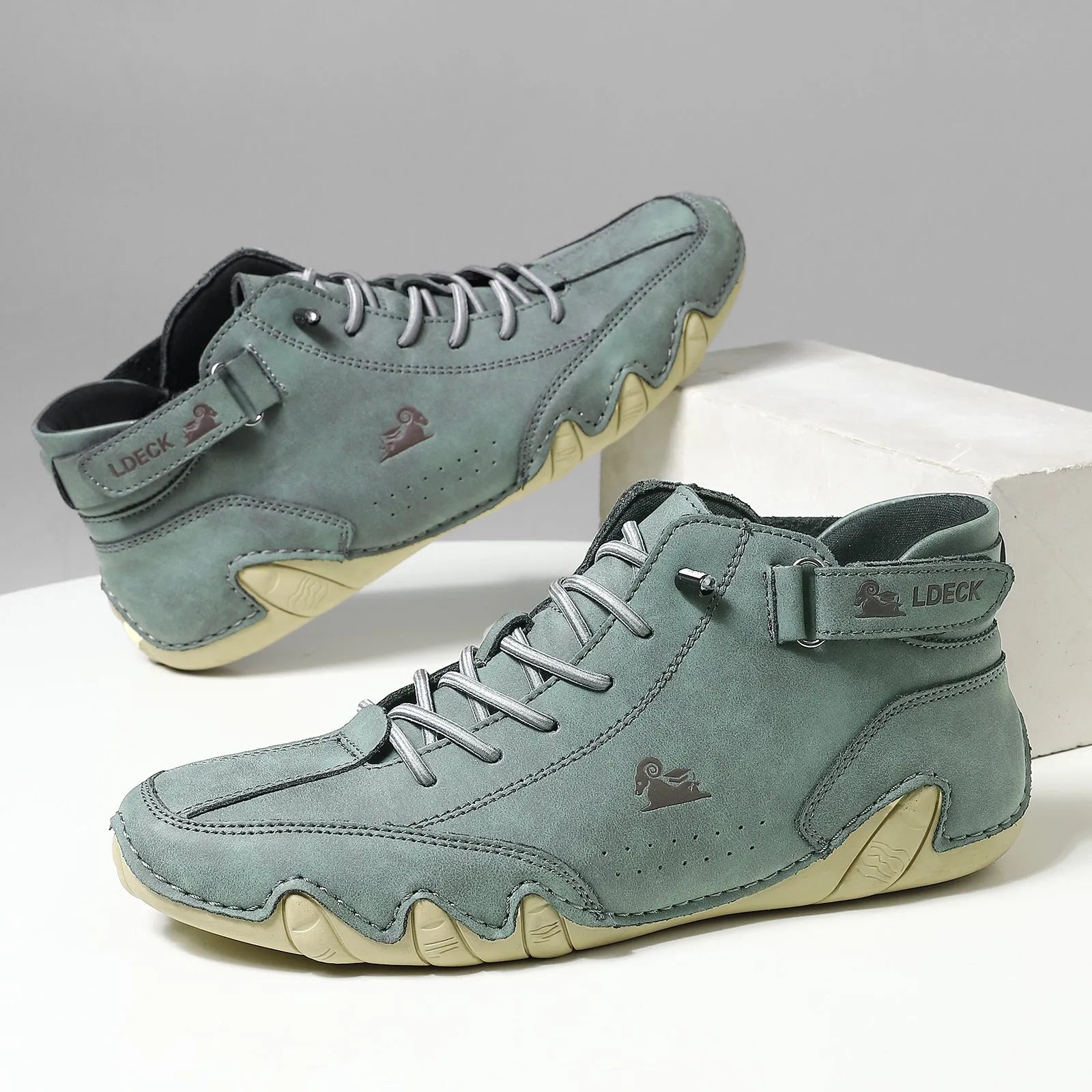 Men's khaki high-top octopus shoes with rubber sole and microfiber upper.