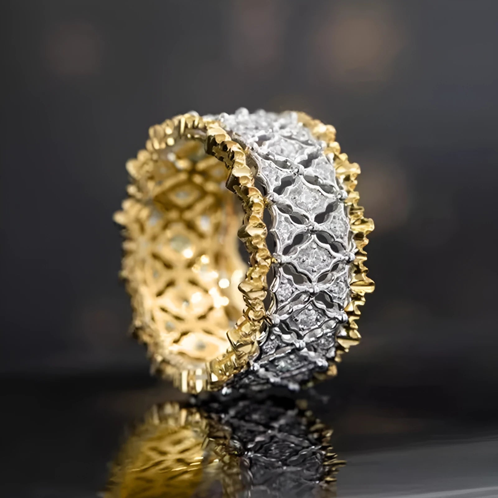 Geometric two-tone gold zircon ring on a copper band, shown in a side view.