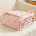 Geometric patterned polyester blanket in milky white showing cotton velvet texture and thickened construction