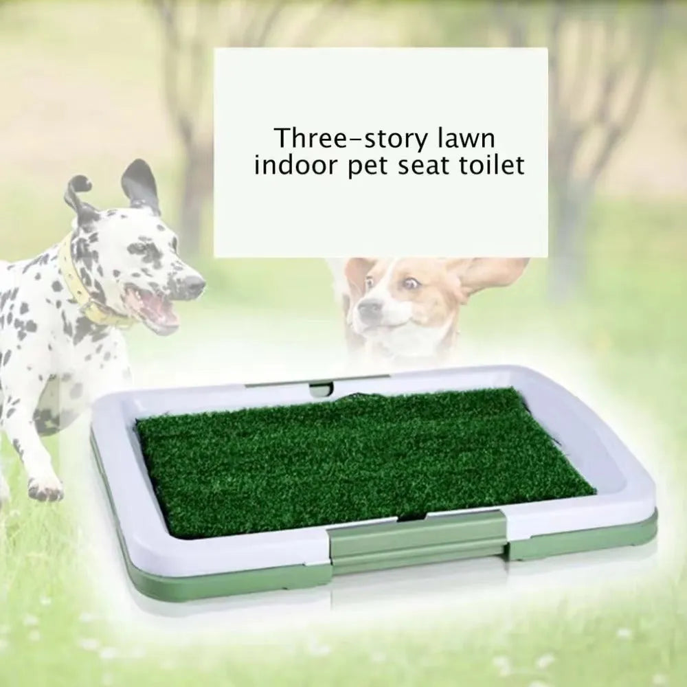 Green artificial grass dog toilet training tray with plastic base and collection basin.