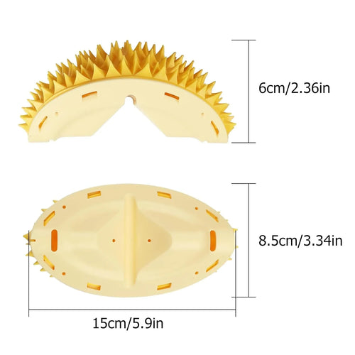 Yellow durian-shaped cat corner scratcher with textured surface and packet of cat mint powder