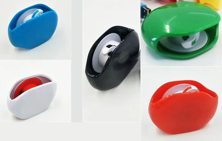 Automatic push-button earphone cable winder reel in assorted colours on a white background.