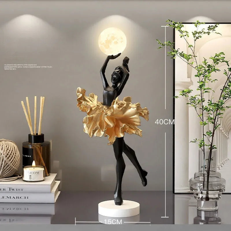 Small modern resin night lamp with USB charging port in black gold colour.