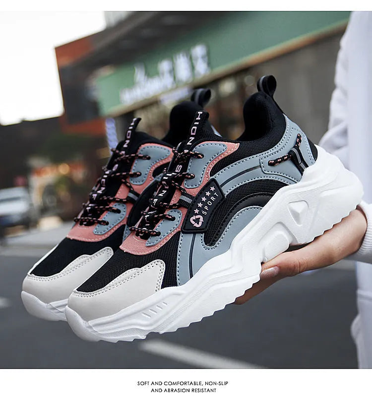 Women's white chunky casual sports shoes with mesh upper and thick mid-heel sole.