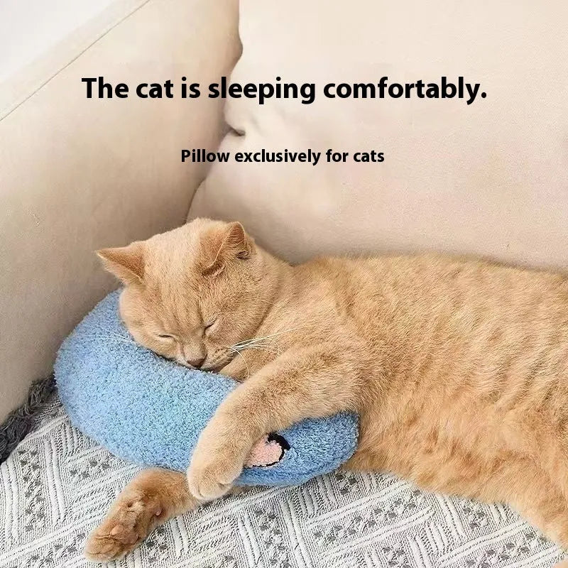 Blue moon-shaped and yellow question mark-shaped cloth pillows for cats, showing U-shaped neck support design.