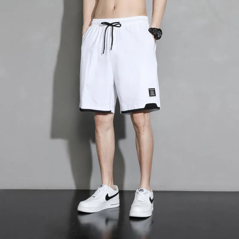 Boys' cotton summer shorts in sporty style available in black, khaki, and white colours