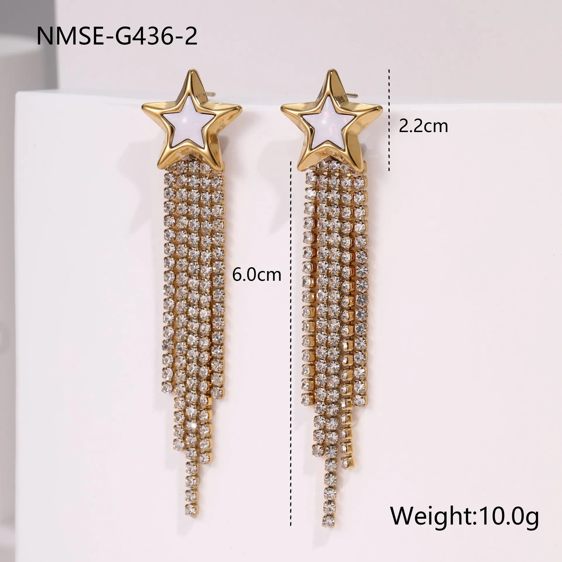 Gold plated stainless steel earrings with love heart and star geometric shapes and diamond tassel details