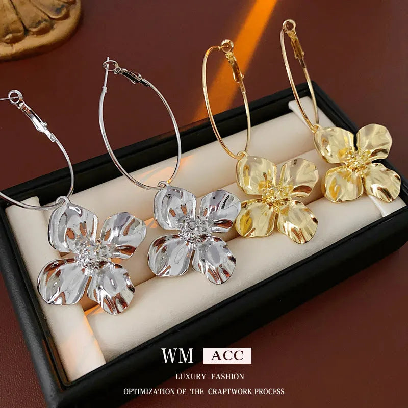 Silver needle flower geometric earrings in gold and silver colour options with vintage styling