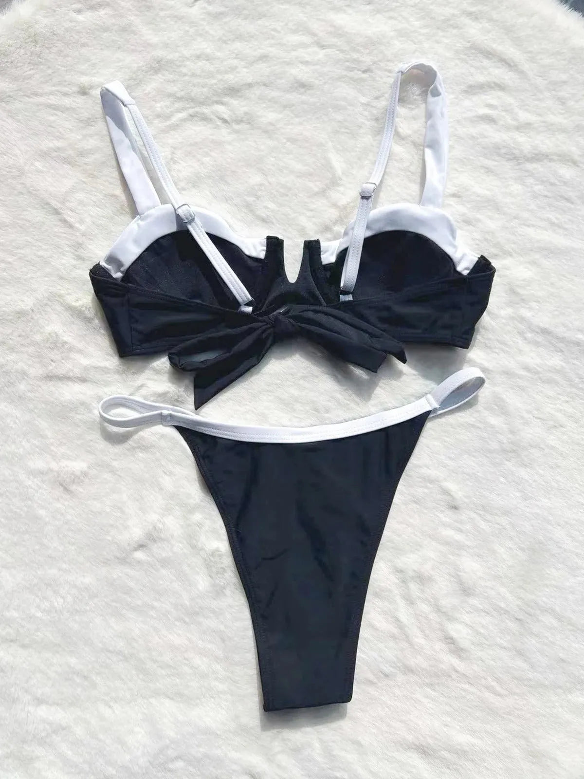 Black low waist women's bikini swimsuit with stitching split detail on the briefs