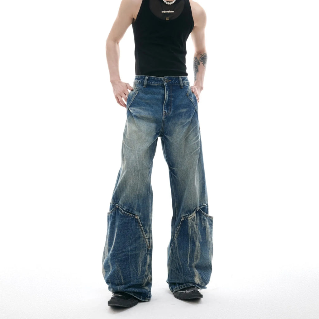 Men's verdant blue loose fit curved knife jeans with retro wash and burst pattern detail
