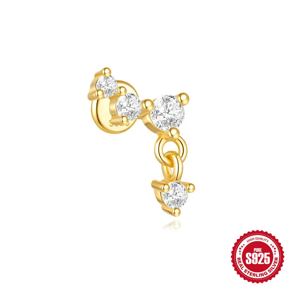 S925 sterling silver geometric star earrings with embedded moon and diamond detail in a gold colour.