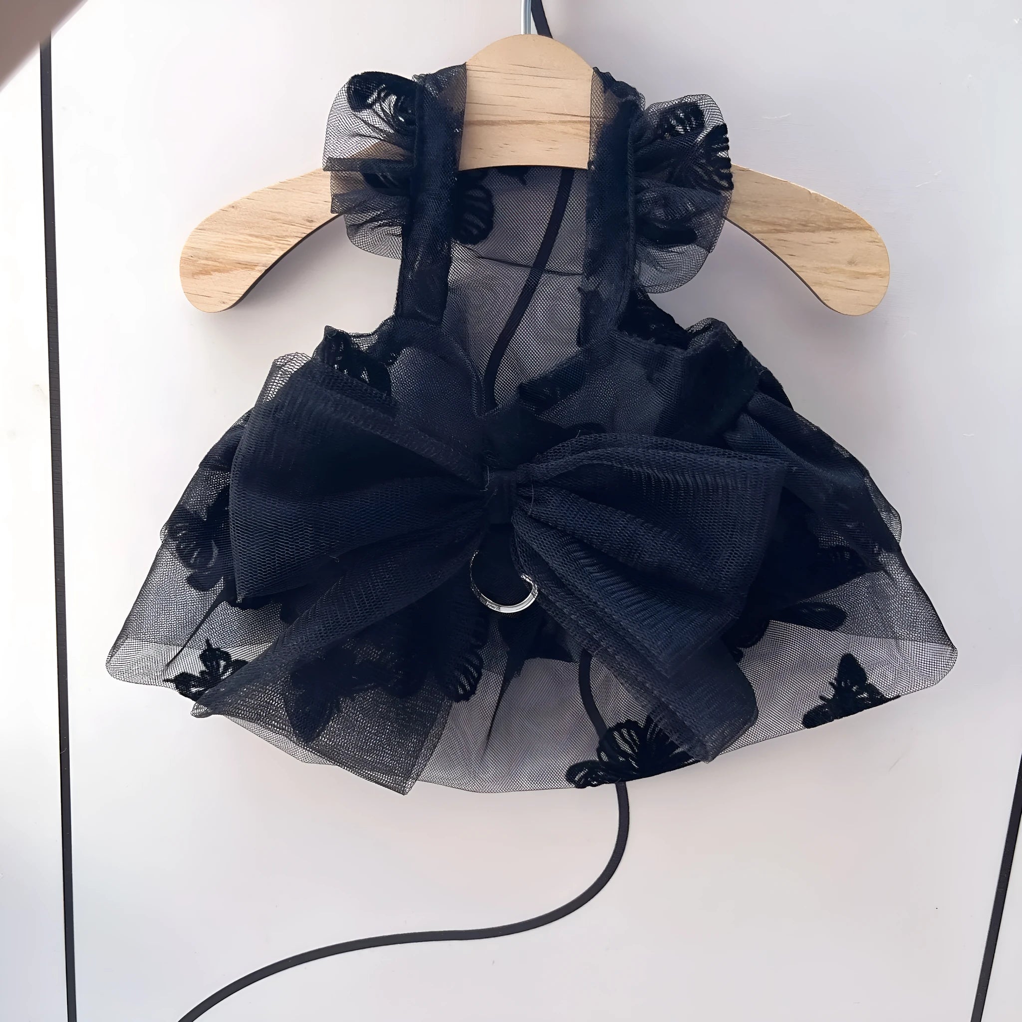 Black princess tulle skirt dress for a small dog or cat on a mannequin, showing the gauze material.