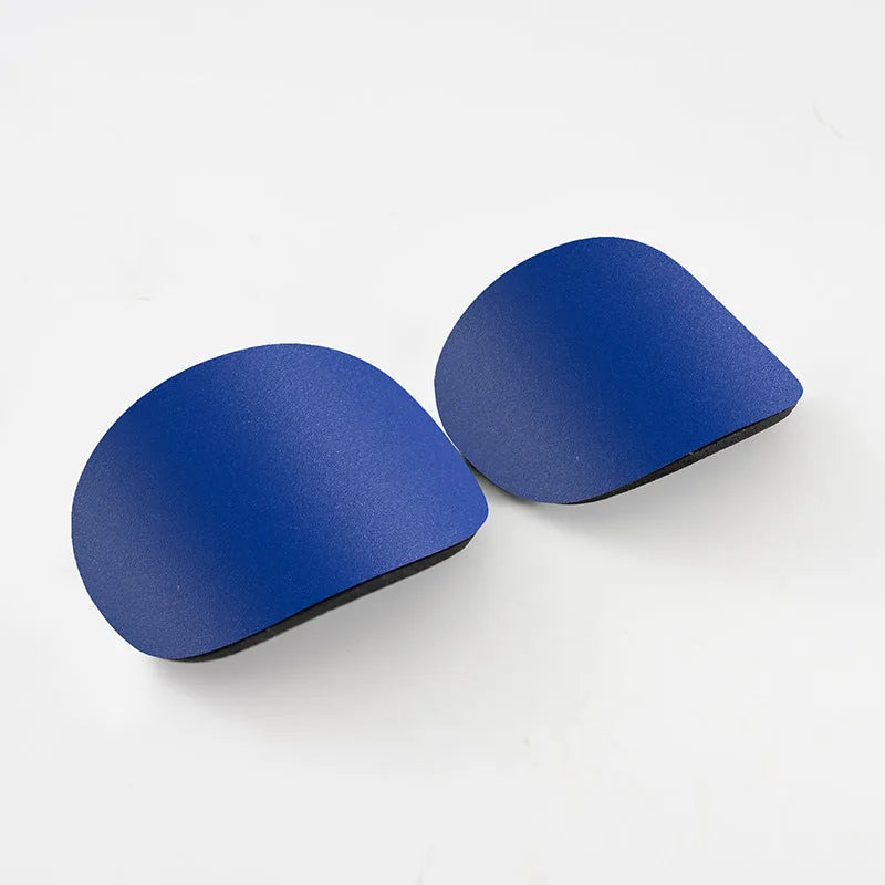 PU mini shin guards for football and sports protection in black, white, red, and blue colours.
