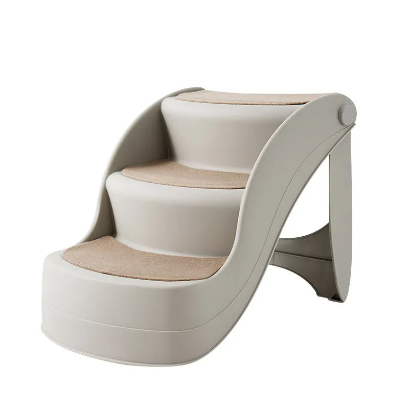 Foldable plastic step ladder for small pets on a wooden floor beside a sofa.
