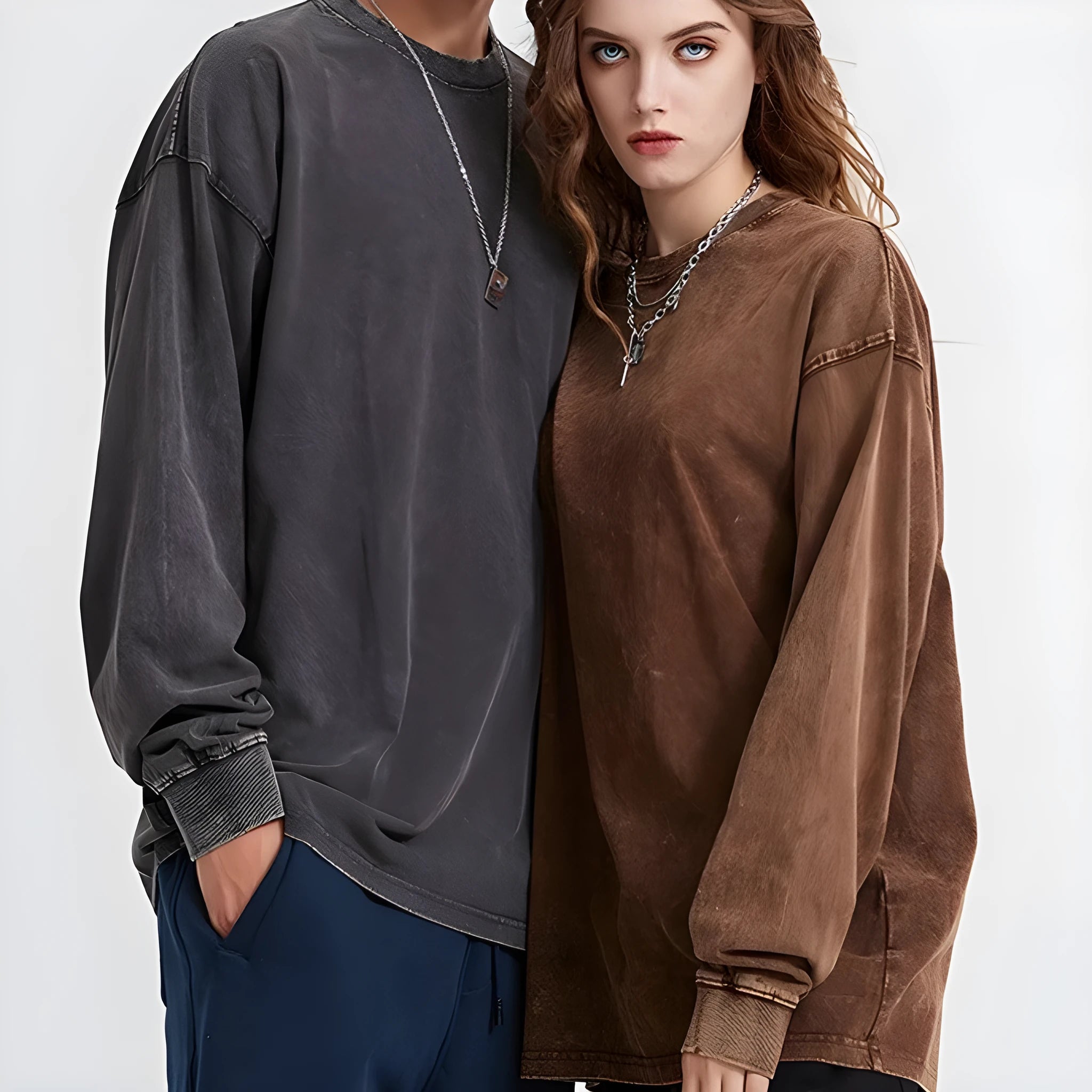 Man wearing a loose-fit, washed vintage long sleeve cotton pullover in a batik colour.