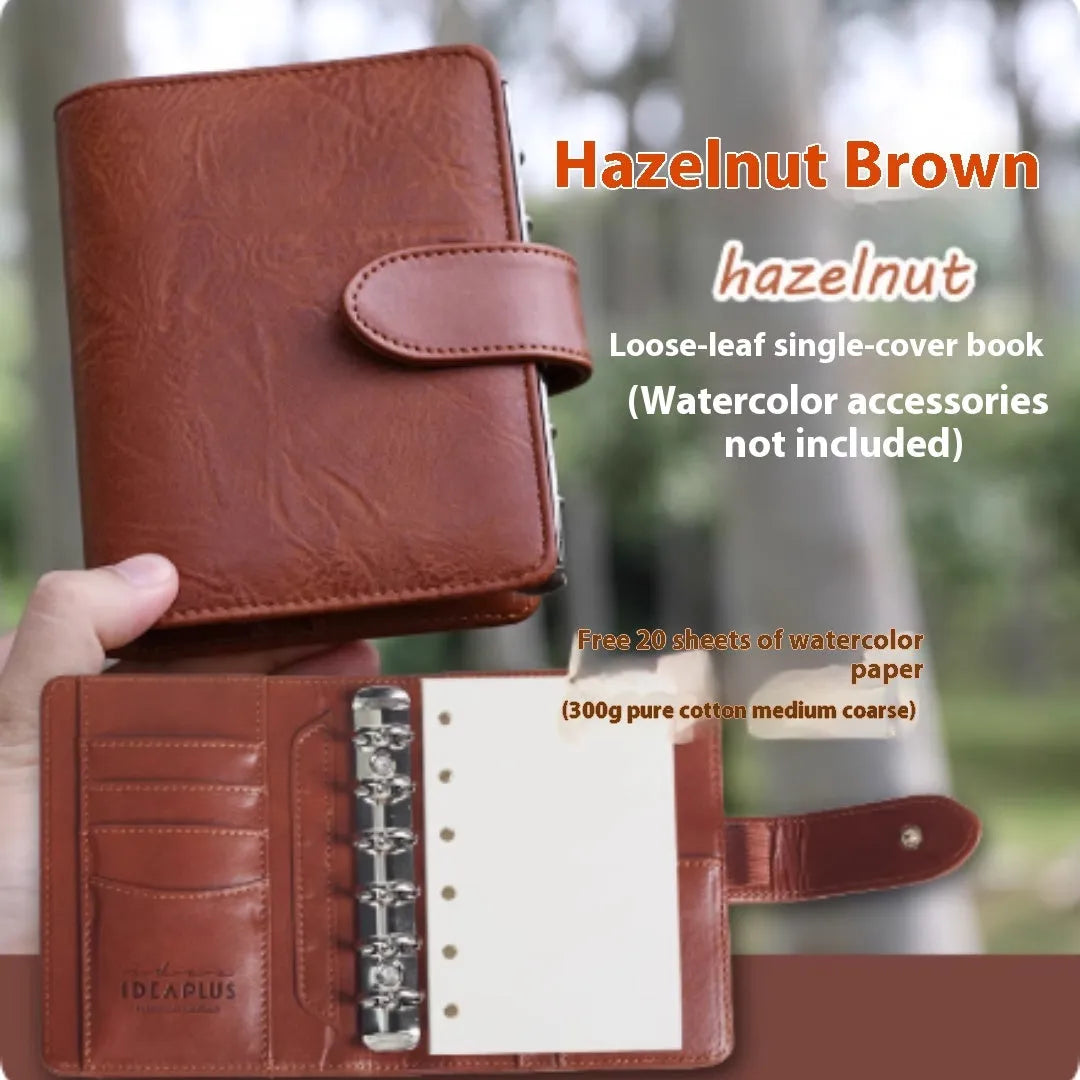 A7 loose-leaf watercolour notebook in avocado green, hazelnut brown, mango pudding, mocha coffee or rainforest green.
