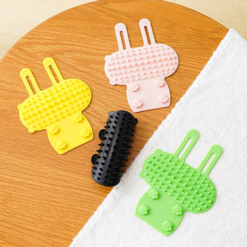Silicone cat grooming comb with rounded teeth and adjustable strap in multiple colours