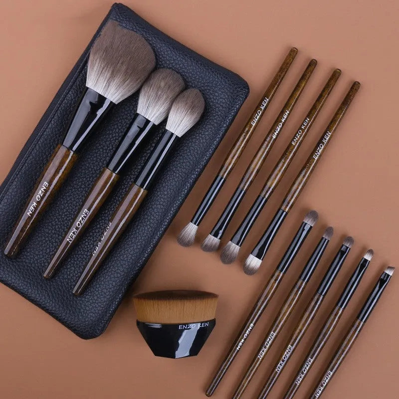 12-piece makeup brush set with wooden handles in a black PU carrying case, including a powder foundation brush.