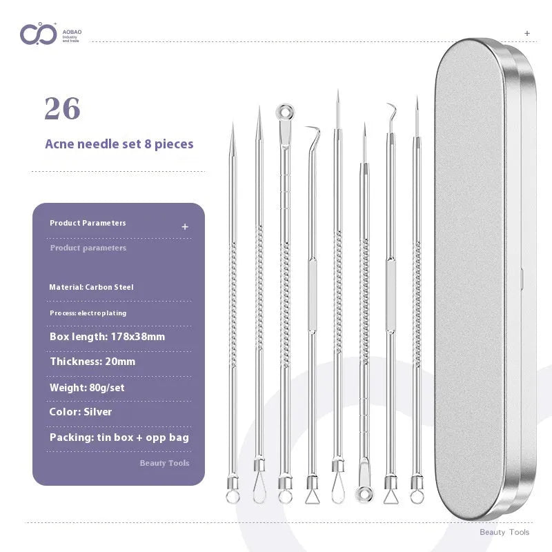 Four silver metal acne needles with pointed tips laid out on a flat surface.