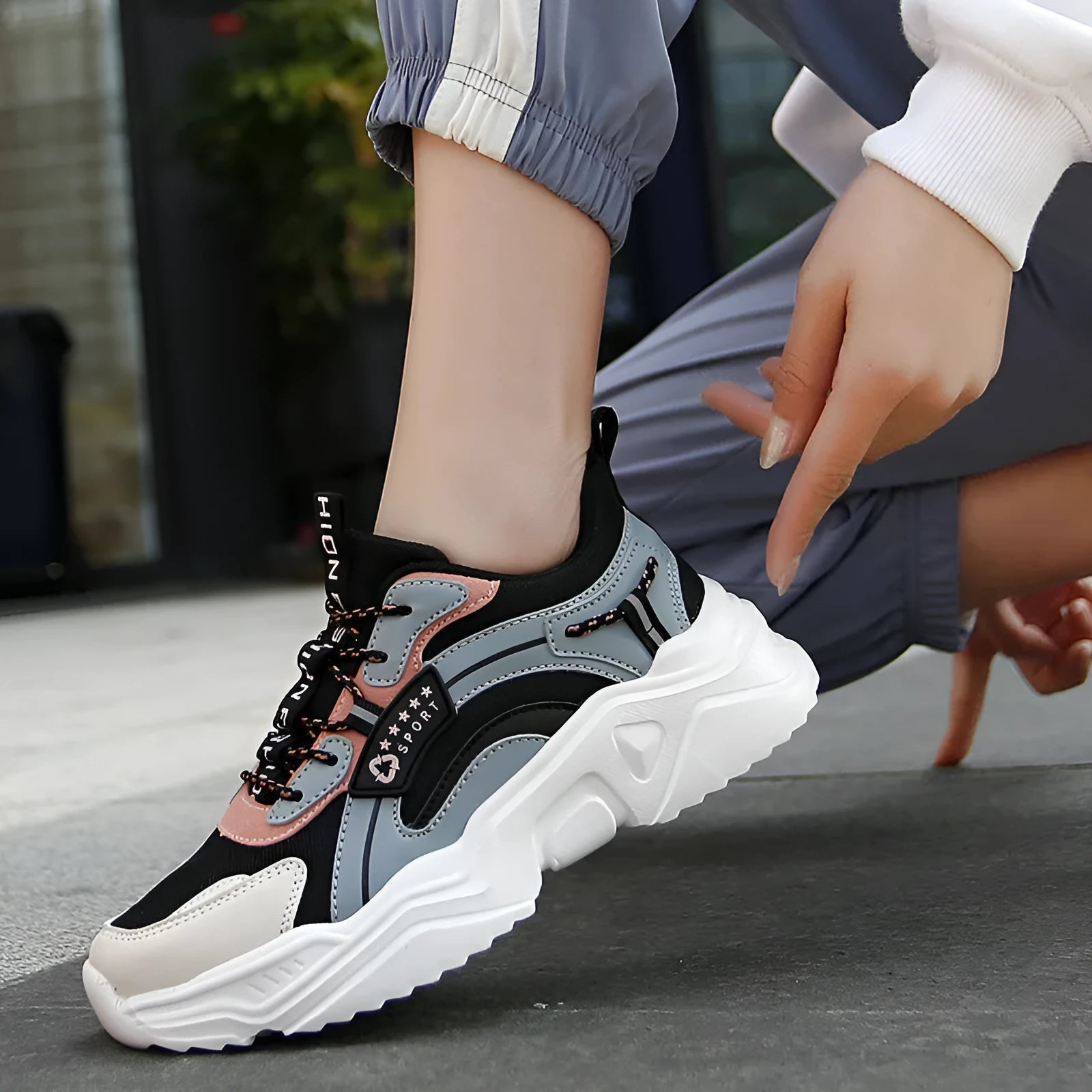 Women's white chunky casual sports shoes with mesh upper and thick mid-heel sole.