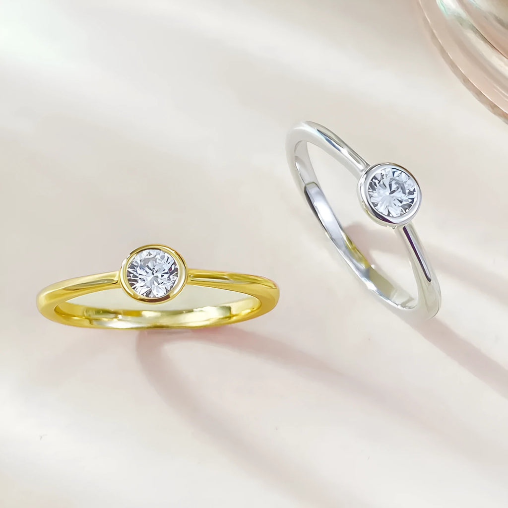 Minimalist sterling silver crown ring with linear details, shown in R962 gold and platinum plating options.