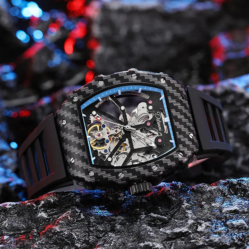 Men's black mechanical waterproof watch with luminous hands on a rubber strap, showing a transparent case back.