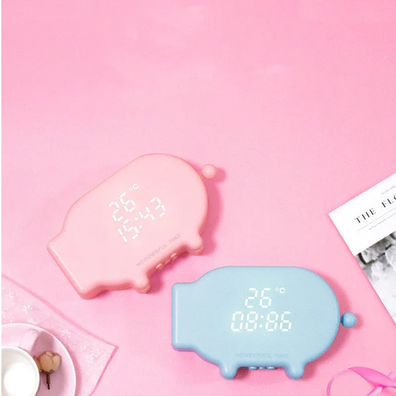 Multifunctional LED alarm clock with temperature display and USB port in blue or pink ABS plastic