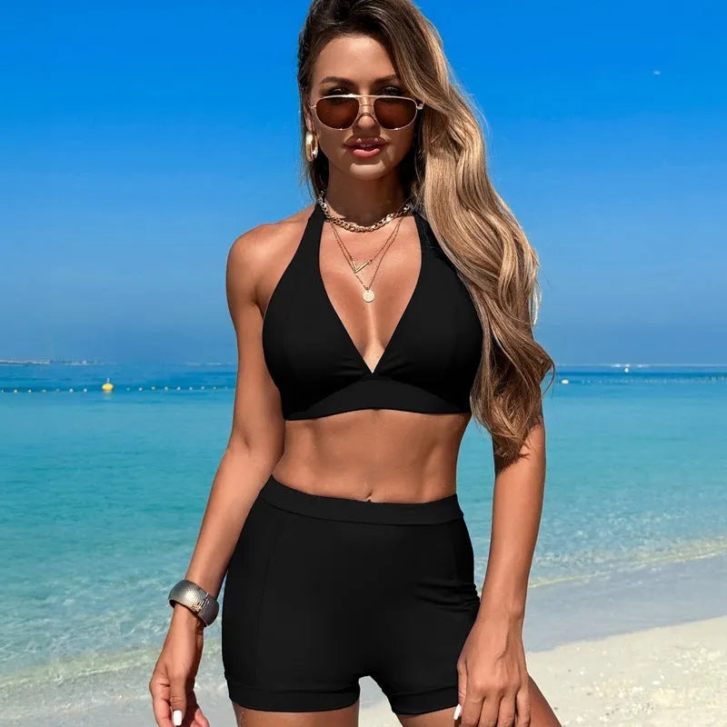 Women's black nylon bikini swimsuit with polyester lining, sized for adult women.