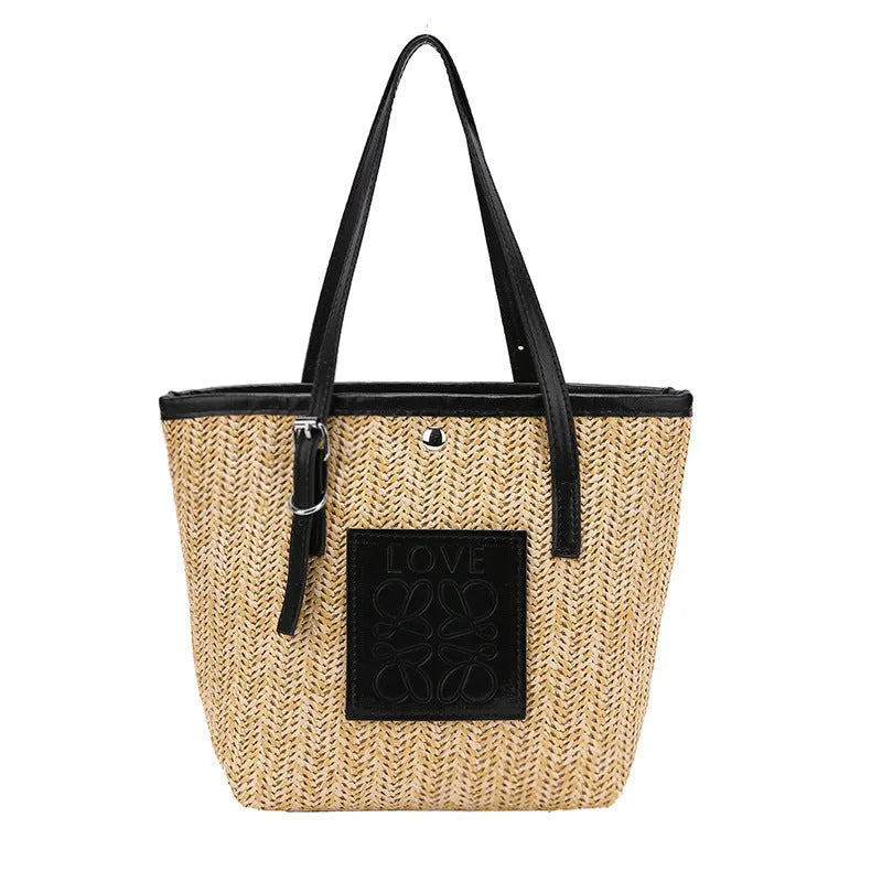 Straw woven women's shoulder bag with three-dimensional pockets in black colour option