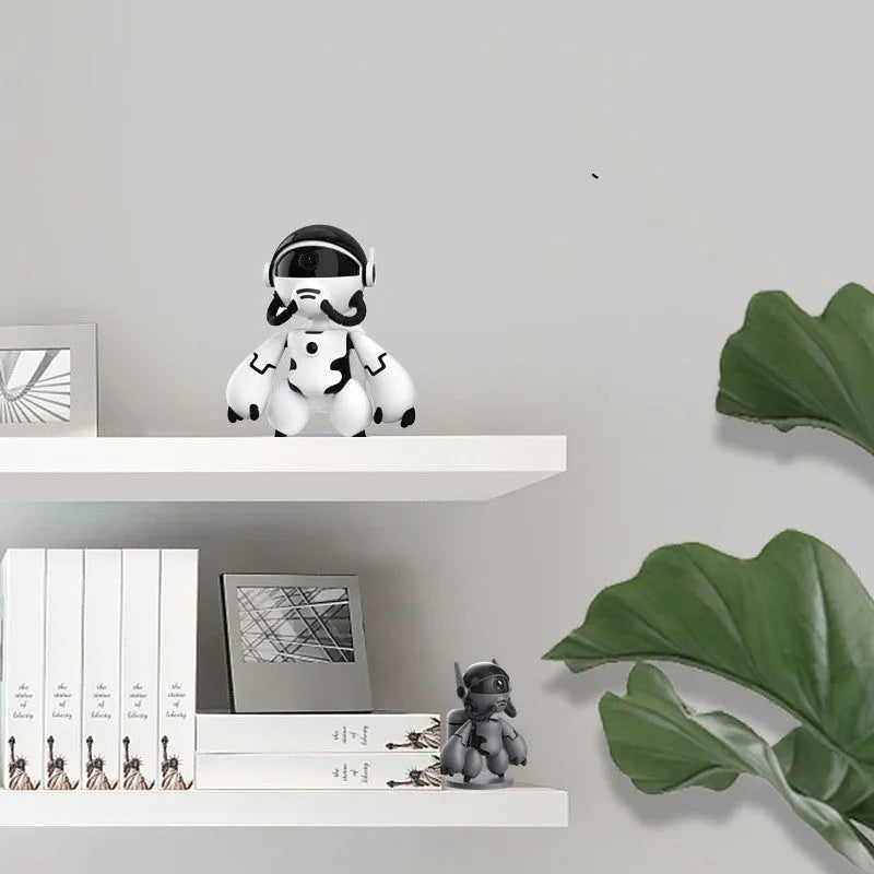 White Space Robot home security camera on a table with a detachable base, showing a wide-angle lens.