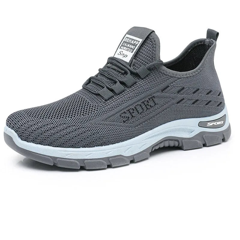 Men's and women's low-top casual sneakers with a round toe and soft PVC sole.
