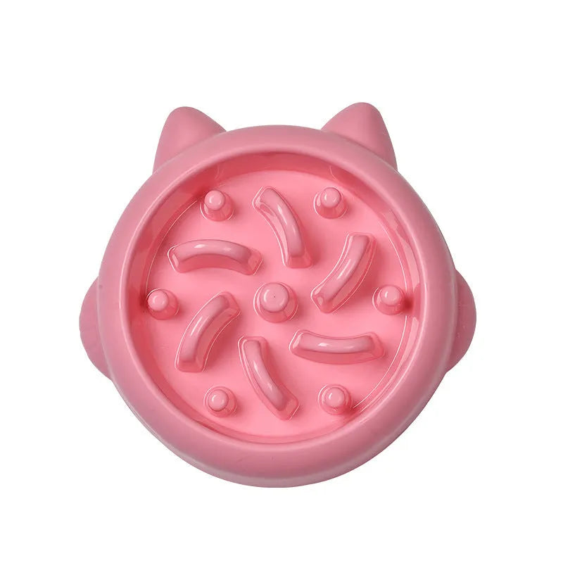 Green slow feeder dog bowl with raised bone-shaped ridges inside