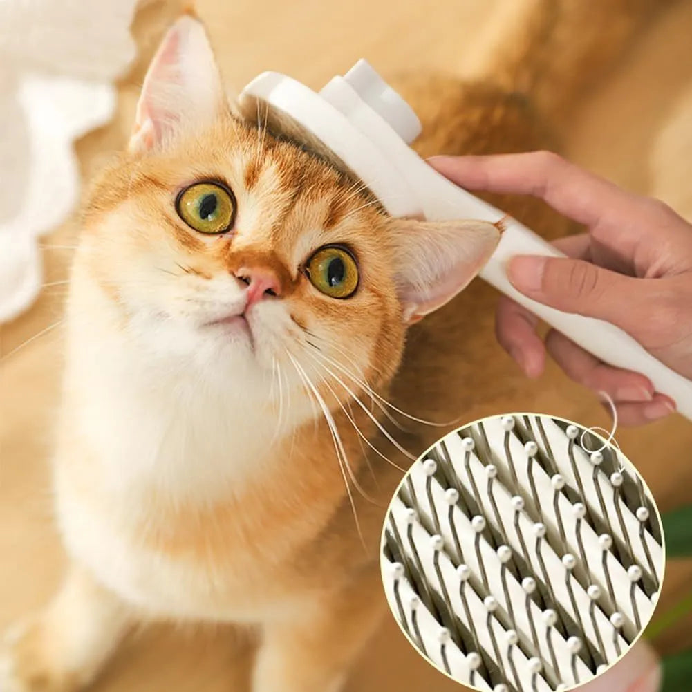 Blue self-cleaning cat brush with massage needles and rubber handle for pet grooming