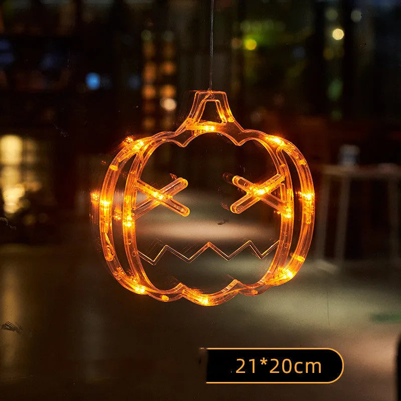 Set of seven Halloween-themed LED hanging lights with suction cups for window display