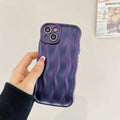 Silicone iPhone 17 case with water ripple texture in green colour showing soft-shell protective design
