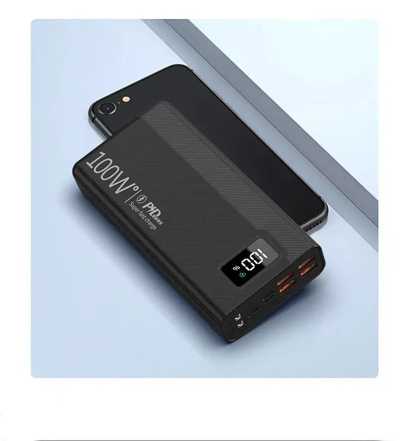 Large capacity black or white plastic power bank with fast charging support.