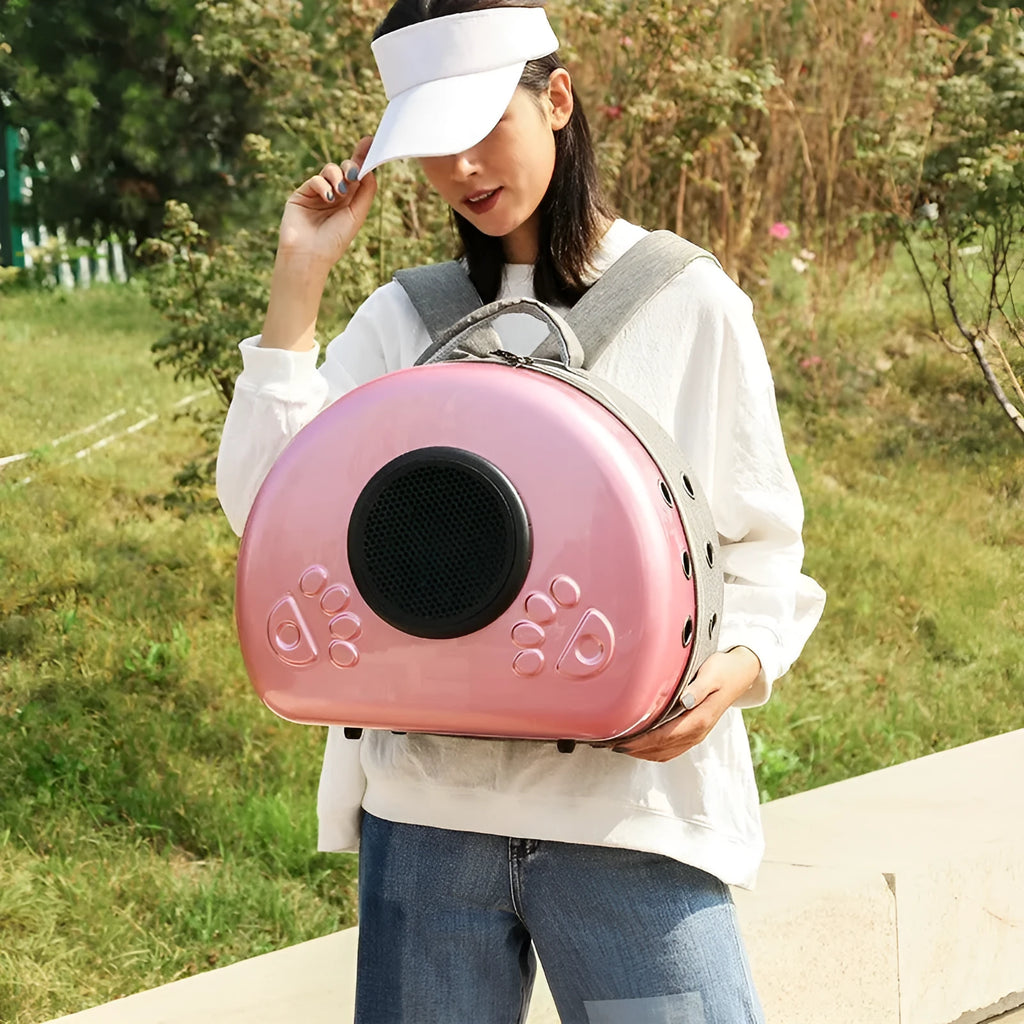Transparent space capsule pet carrier bag for cats in rose gold, luxury silver, or champagne gold.