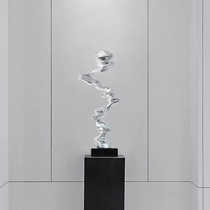 Modern abstract resin sculpture decoration in Ran Ran Rose gold, silver, or blue.