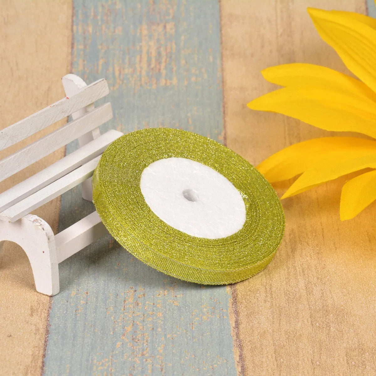 Colourful green onion pattern polyester ribbon with gold wire detailing, 1cm wide.