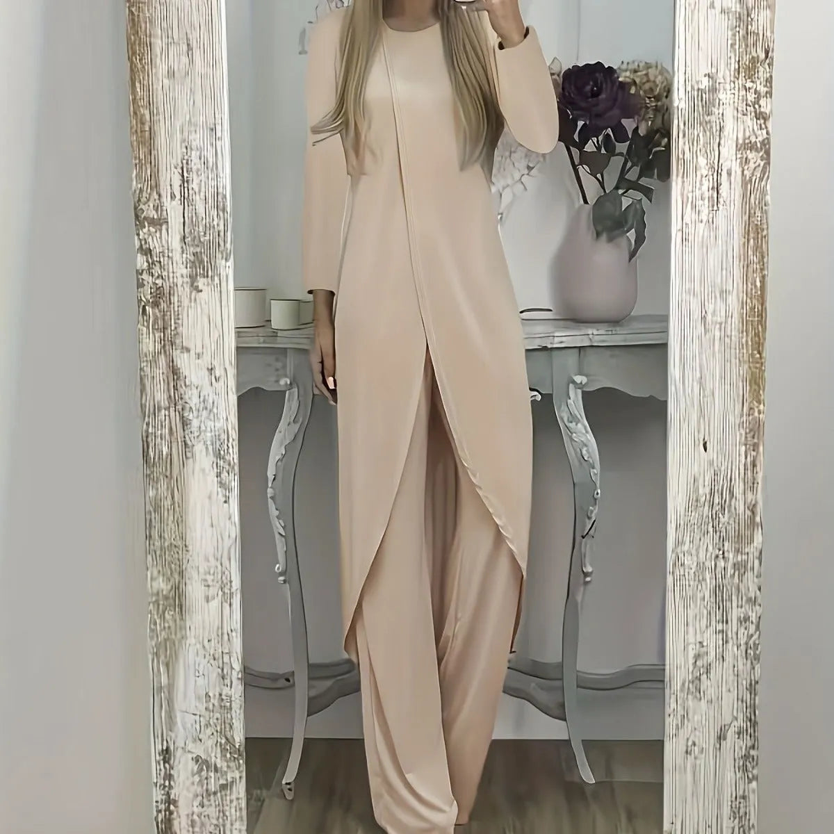 Casual black long sleeve round neck top and loose trousers two-piece lounge wear set.