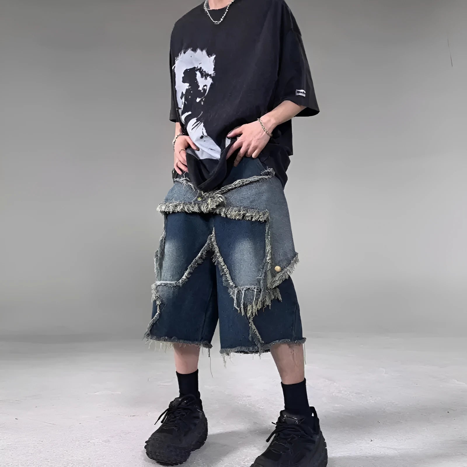 Blue denim shorts with American retro style, frayed detailing, and five-pointed star patches
